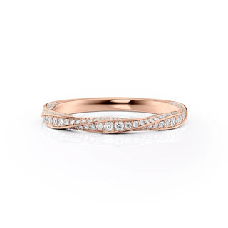 Twisted wedding band with round diamonds – stylish and elegant intertwined design