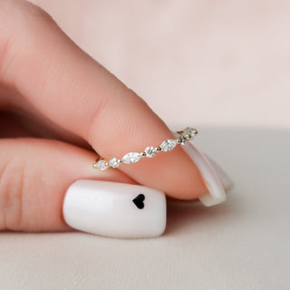 Dainty wedding band with round and marquise diamonds – delicate and elegant design