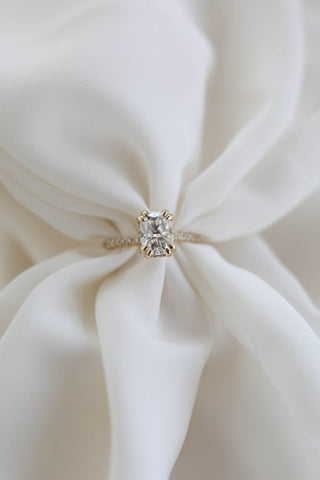 1.50–3.50 CT elongated cushion cut lab grown diamond engagement ring with pave band in 14K gold, featuring soft curves and brilliance.