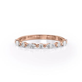 Dainty wedding band with round and marquise diamonds – delicate and elegant design