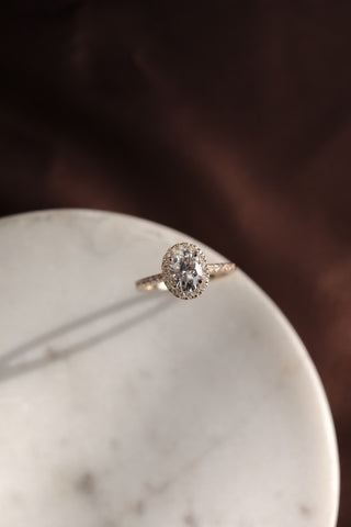 1.20–3.50 CT oval cut lab grown diamond engagement ring with halo and pave band in 14K gold, offering radiant sparkle and grace.