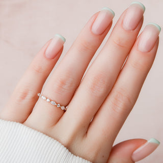 Dainty wedding band with round and marquise diamonds – delicate and elegant design