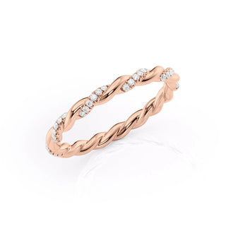 Twisted wedding band with round diamonds – elegant and unique braided design