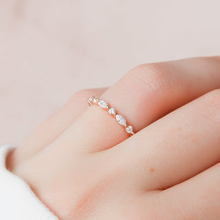 Dainty wedding band with round and marquise diamonds – delicate and elegant design