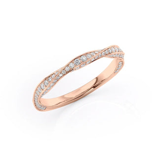 Twisted wedding band with round diamonds – stylish and elegant intertwined design