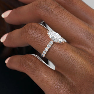3 to 7 carat marquise CVD diamond ring with hidden halo and pave setting.