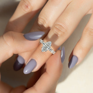 3 to 7 carat marquise CVD diamond ring with hidden halo and pave setting.