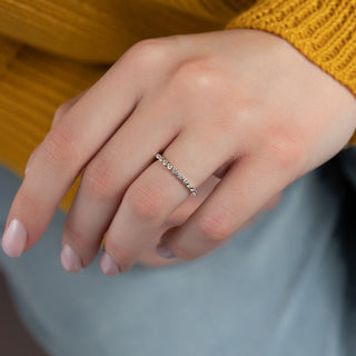 Half eternity wedding band with round diamonds – elegant and timeless design