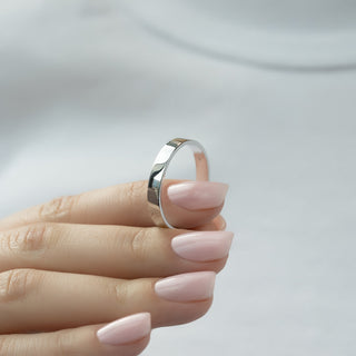 Plain wedding band with sleek polished finish – classic and minimalist design