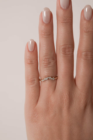 0.12 TCW Round Curved Diamond Wedding Band