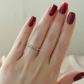 Unique wedding band with round diamonds – modern and artistic design