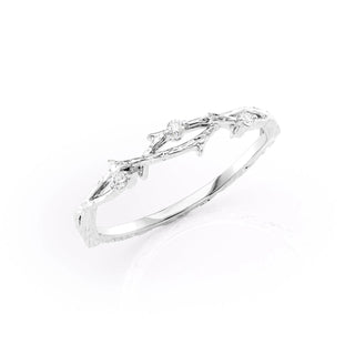 Twig-inspired wedding band with round diamonds – nature-themed and elegant design