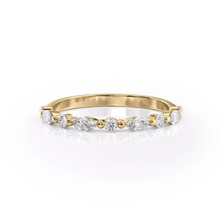 Dainty wedding band with round and marquise diamonds – delicate and elegant design