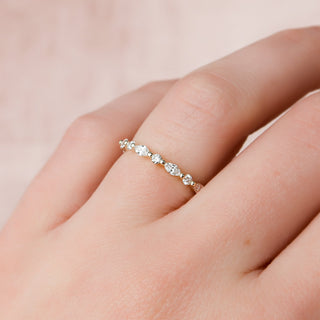 Dainty wedding band with round and marquise diamonds – delicate and elegant design