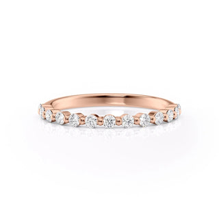 Half eternity wedding band with round diamonds – elegant and timeless design