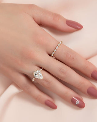 Pear cut CVD lab grown diamond engagement ring with pave band in 14K gold, designed for graceful sparkle and timeless elegance.
