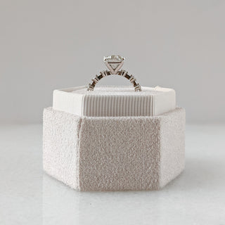 Emerald cut lab grown diamond dainty engagement ring in 14K gold with delicate setting, designed for subtle sparkle and elegance.