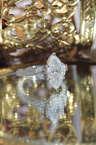 Marquise cut diamond engagement ring with pave setting in 1.5 to 3.5 carat size.