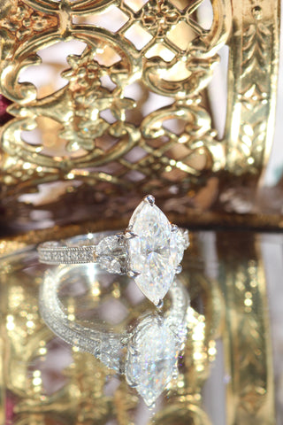 Marquise cut diamond engagement ring with pave setting in 1.5 to 3.5 carat size.