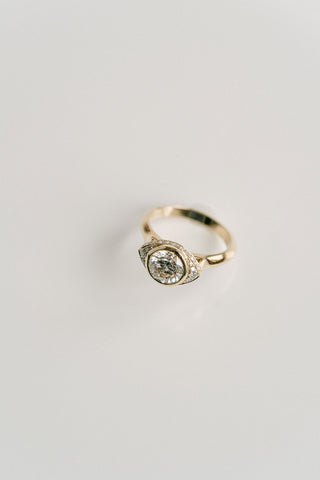 Round lab grown diamond halo engagement ring with micro-pave accents in 14K gold, designed for bold yet elegant sparkle.