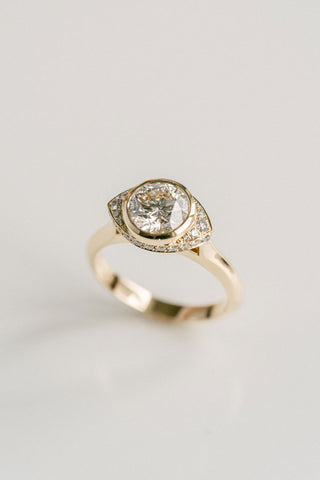 Round lab grown diamond halo engagement ring with micro-pave accents in 14K gold, designed for bold yet elegant sparkle.