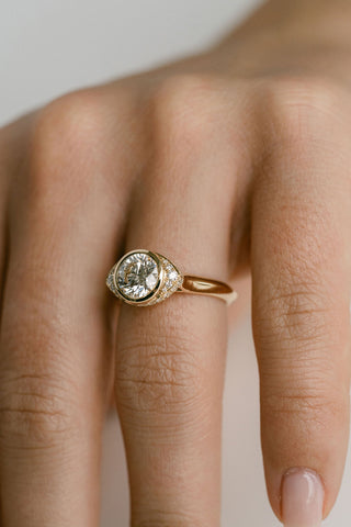 Round lab grown diamond halo engagement ring with micro-pave accents in 14K gold, designed for bold yet elegant sparkle.