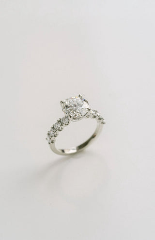 Round lab grown diamond engagement ring with pave band in 14K gold, designed for maximum brilliance and modern elegance.