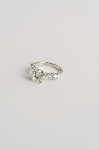 Round lab grown diamond engagement ring with pave band in 14K gold, designed for maximum brilliance and modern elegance.