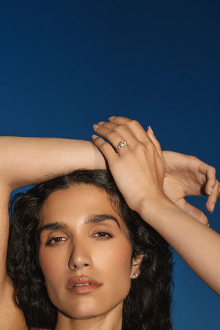 Round lab grown diamond halo engagement ring with micro-pave accents in 14K gold, designed for bold yet elegant sparkle.