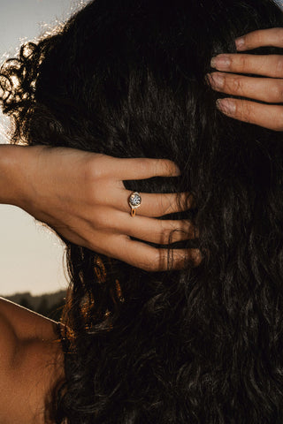 Round lab grown diamond halo engagement ring with micro-pave accents in 14K gold, designed for bold yet elegant sparkle.