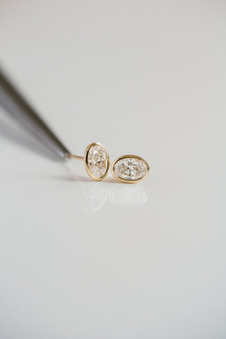 0.77 TCW Oval Moissanite Diamond Bezel Stud Earrings
