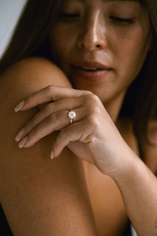 Round lab grown diamond solitaire engagement ring in 14K gold with sleek prong setting, handcrafted for timeless elegance.