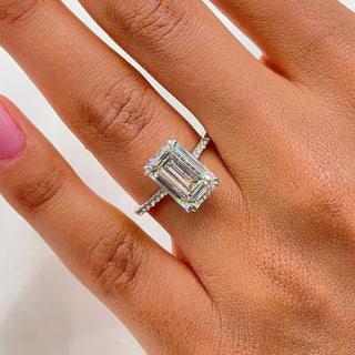Emerald cut lab grown diamond engagement ring with wide pave band in 14K gold, showcasing clean lines and radiant sparkle.