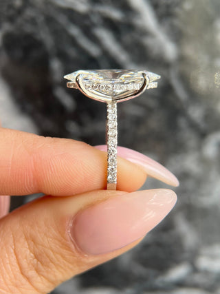 Marquise lab grown diamond engagement ring with hidden halo setting and pave band in 14K gold, elegant and ethically handcrafted.