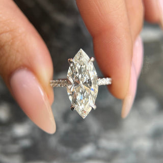 Marquise lab grown diamond engagement ring with hidden halo setting and pave band in 14K gold, elegant and ethically handcrafted.