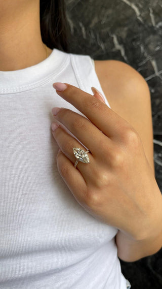 Marquise lab grown diamond engagement ring with hidden halo detail and pave band in gold, ethically crafted for timeless brilliance.