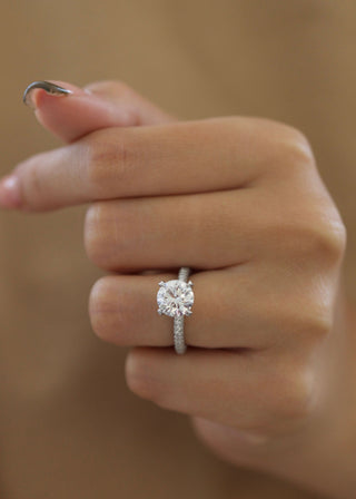 Round Diamond Engagement Ring with pave setting and sparkling round cut center stone
