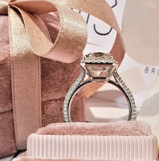 Radiant cut lab grown diamond engagement ring with halo setting in 14K gold, showcasing brilliant sparkle and refined design.