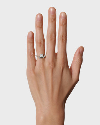 Unique engagement ring featuring round lab grown diamond in an artistic 14K gold setting, designed for standout elegance.