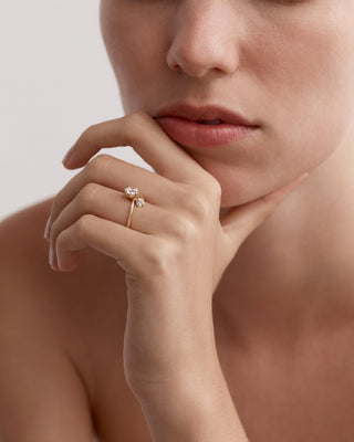 Unique engagement ring featuring round lab grown diamond in an artistic 14K gold setting, designed for standout elegance.