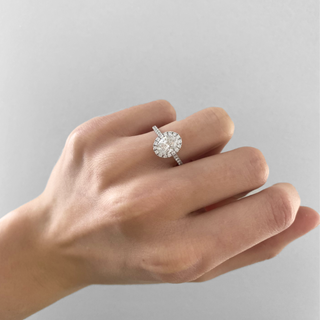 Oval lab grown CVD diamond engagement ring with halo and pave design – 1.02 to 3.0 CT range.