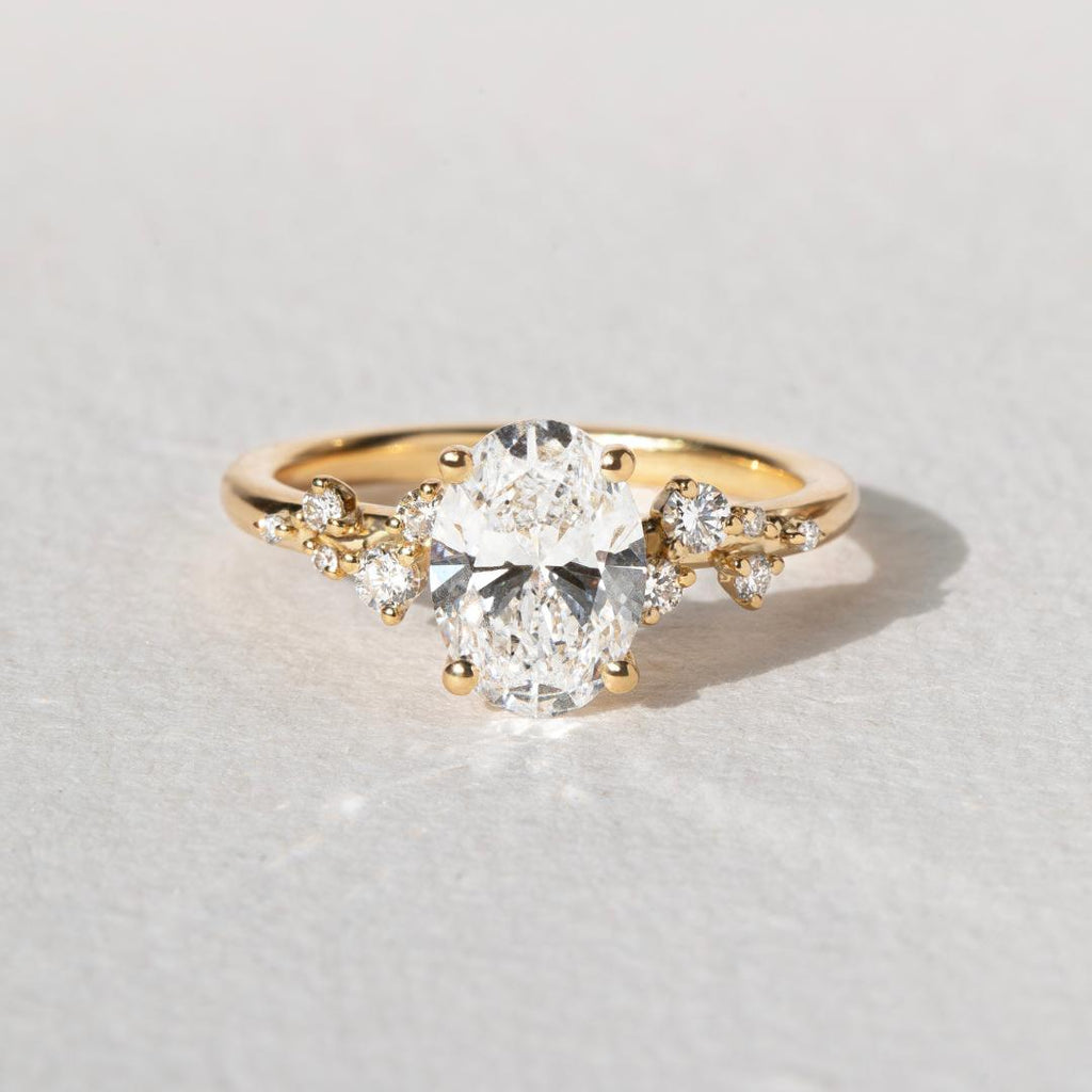 1.3 CT Oval Diamond Silhouette Cluster Engagement Ring
