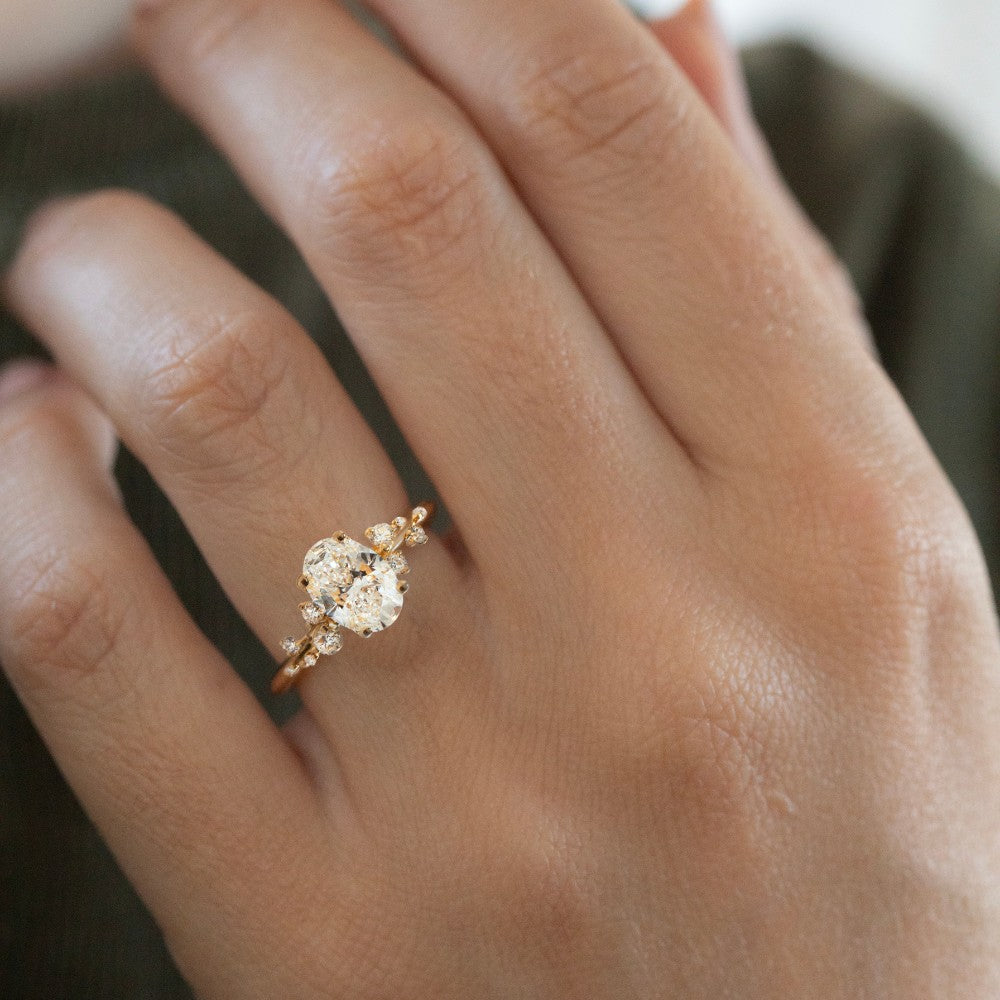 1.3 CT Oval Diamond Silhouette Cluster Engagement Ring