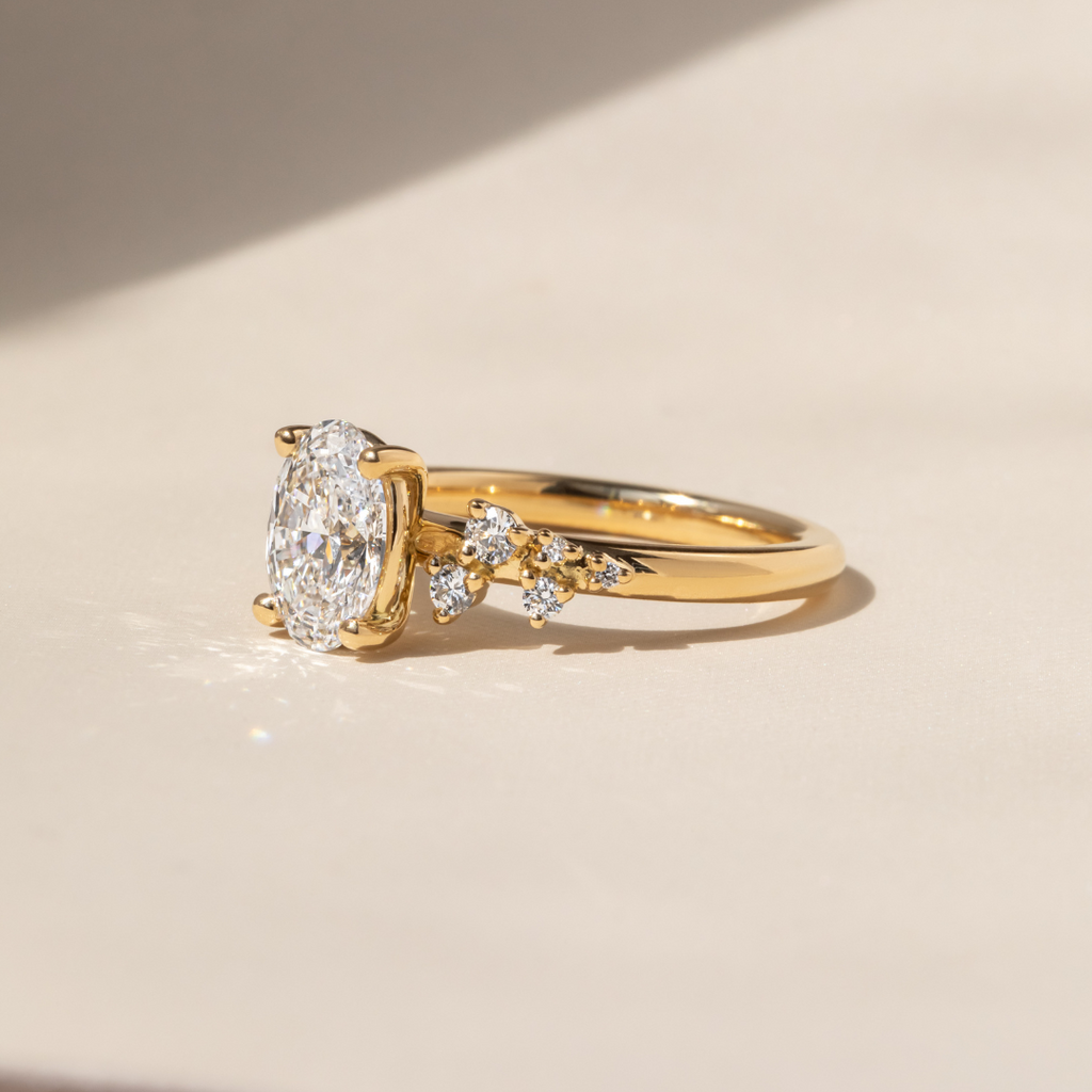 1.3 CT Oval Diamond Silhouette Cluster Engagement Ring