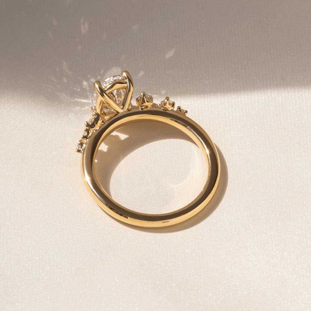 1.3 CT Oval Diamond Silhouette Cluster Engagement Ring