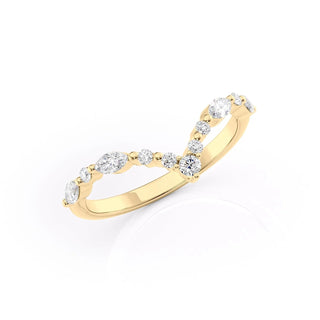 Curved wedding band with round and marquise diamonds – graceful and unique design