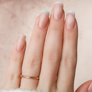 Simple plain wedding band with smooth polished finish – elegant and timeless
