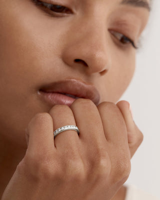 0.70 TCW Round Diamond Channel Wedding Band