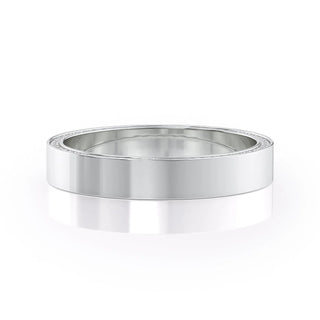 Unique wedding band with round diamonds – modern design with artistic flair