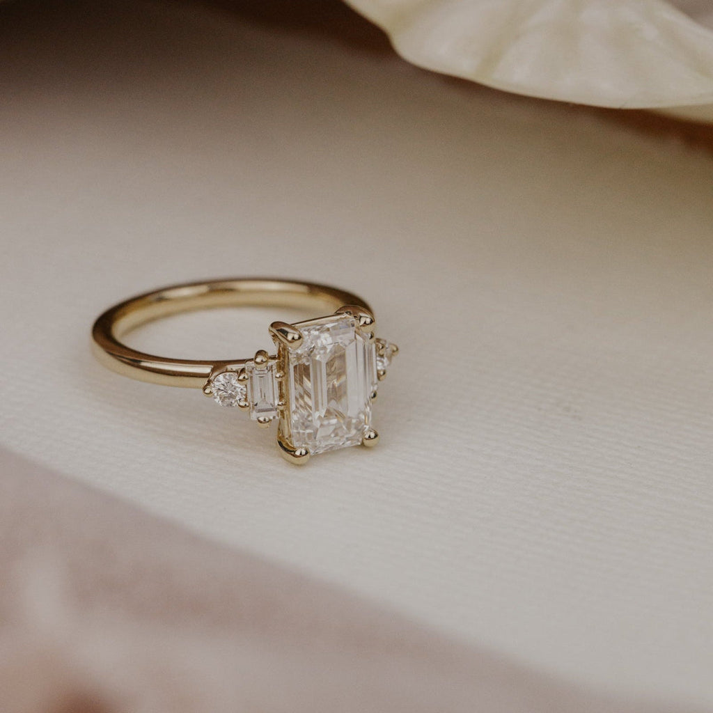 2.0 CT Emerald Diamond Grace Accent Three Stone Engagement Ring